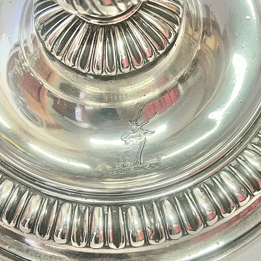 Crested pair of George II sterling silver candlesticks by Elizabeth Godfrey