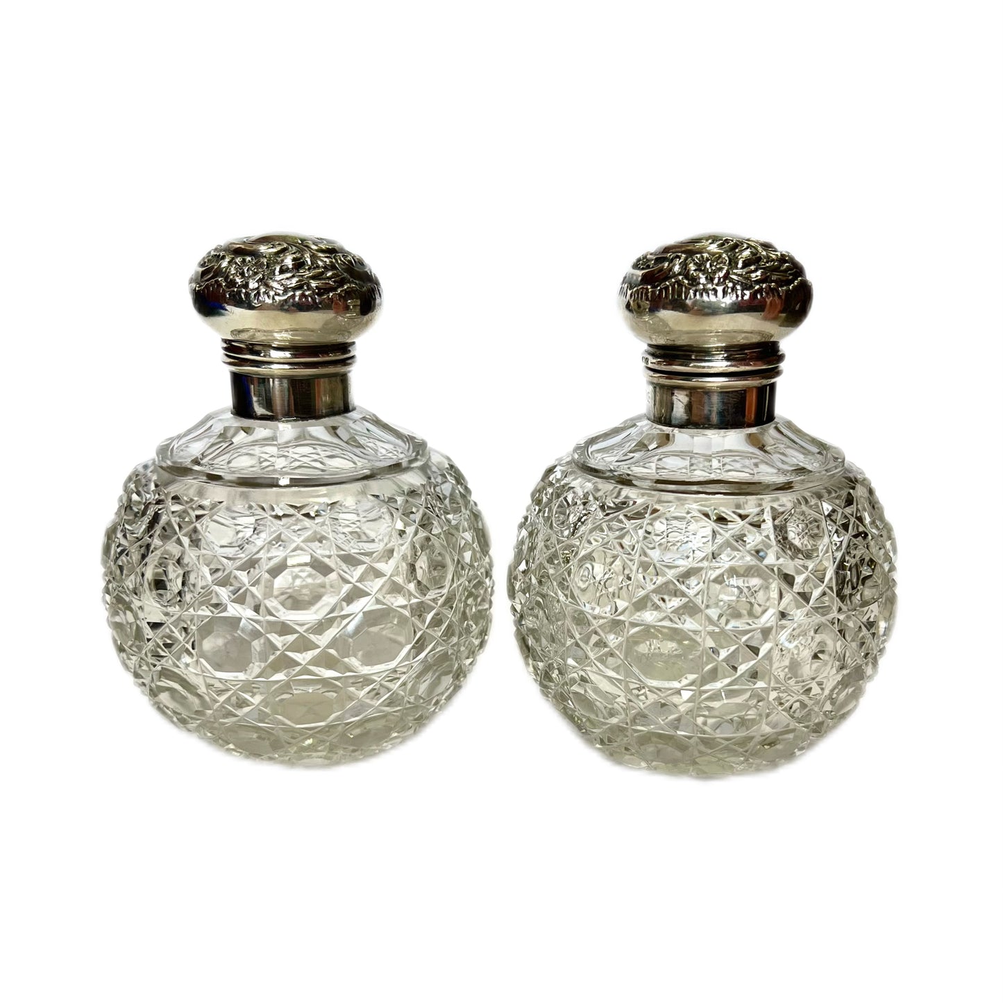 Cased set of two Edwardian sterling sliver and cut glass perfume bottles by G. &; T. Young, NZ