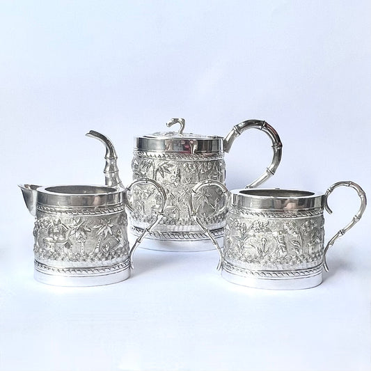 Late Victorian to Edwardian period Anglo-Indian Calcutta silver tea set comprising teapot, sugar bowl and creamer jug