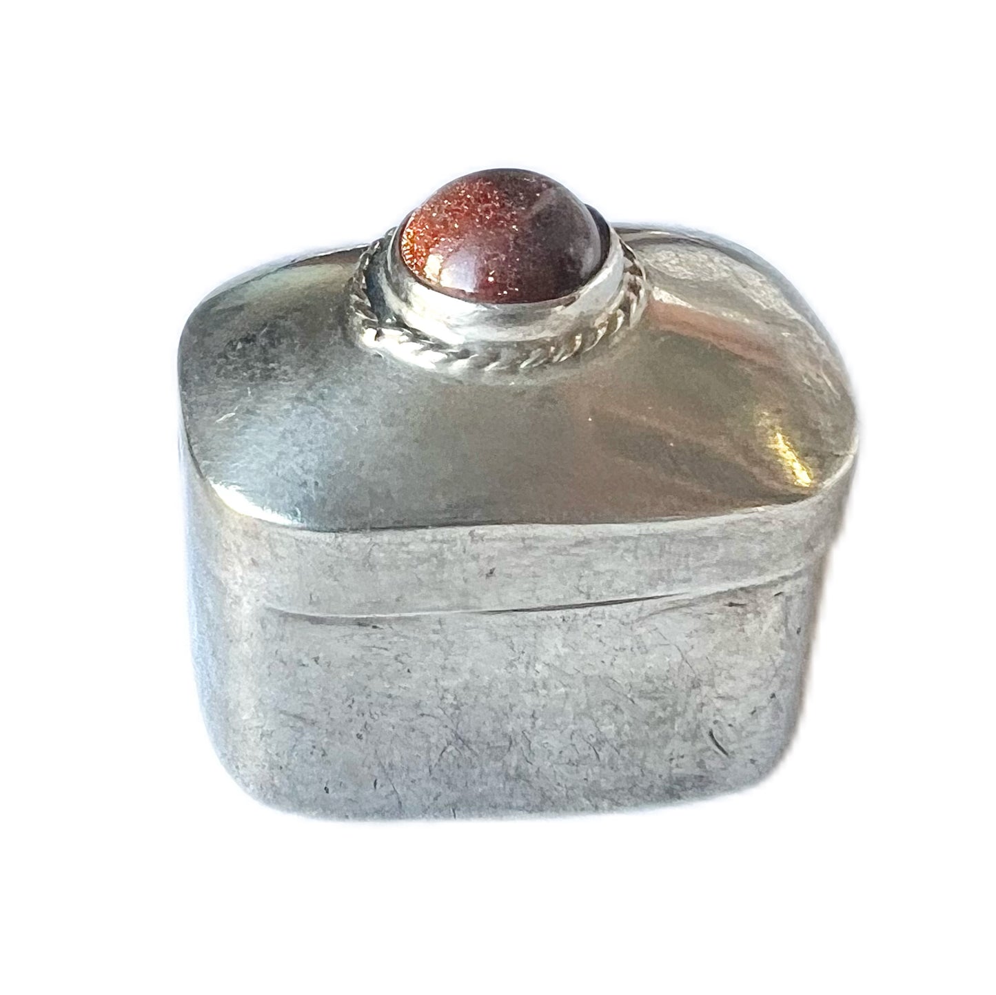 Midcentury Mexican Taxco silver pillbox with goldstone cabochon
