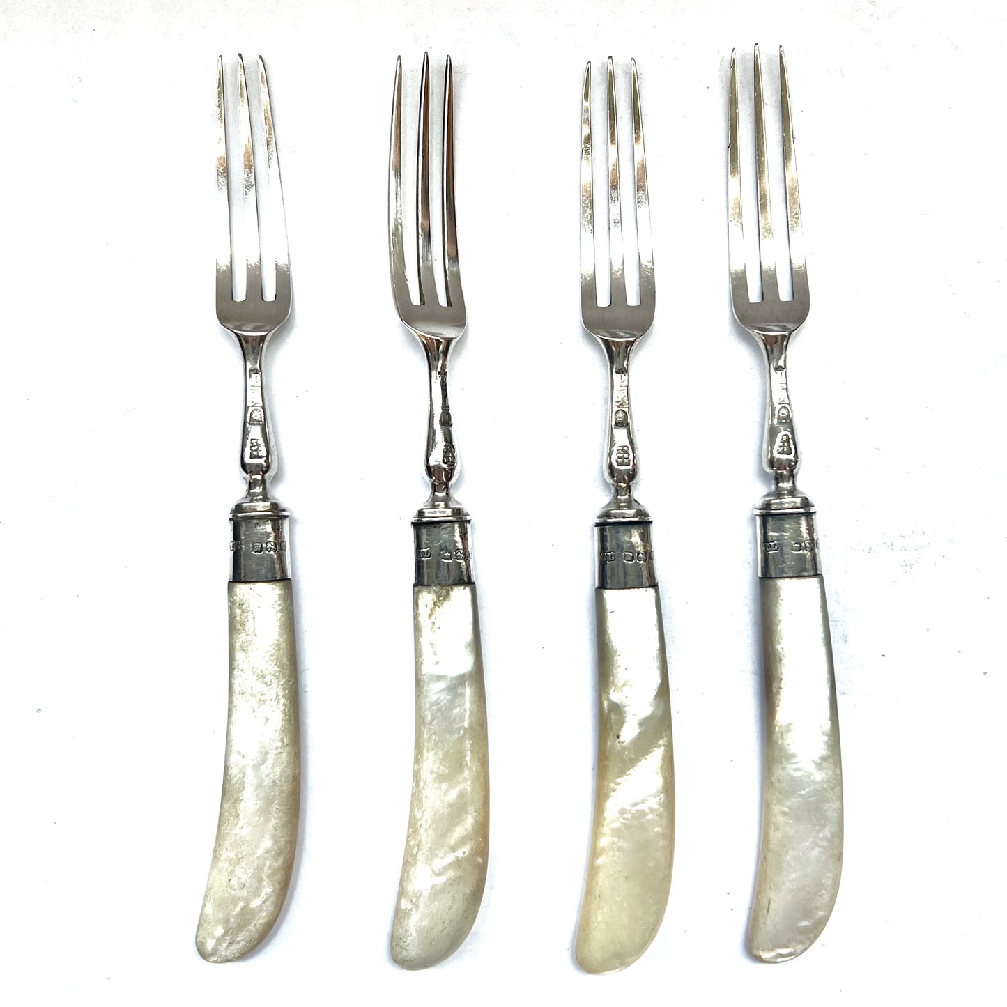 4 sterling silver hors d’oeuvre forks with marks for London, 1899, Holland, Aldwinckle &amp; Slater (Thomas Alfred Slater, Walter Brindsley Slater &amp; Henry Arthur Holland)