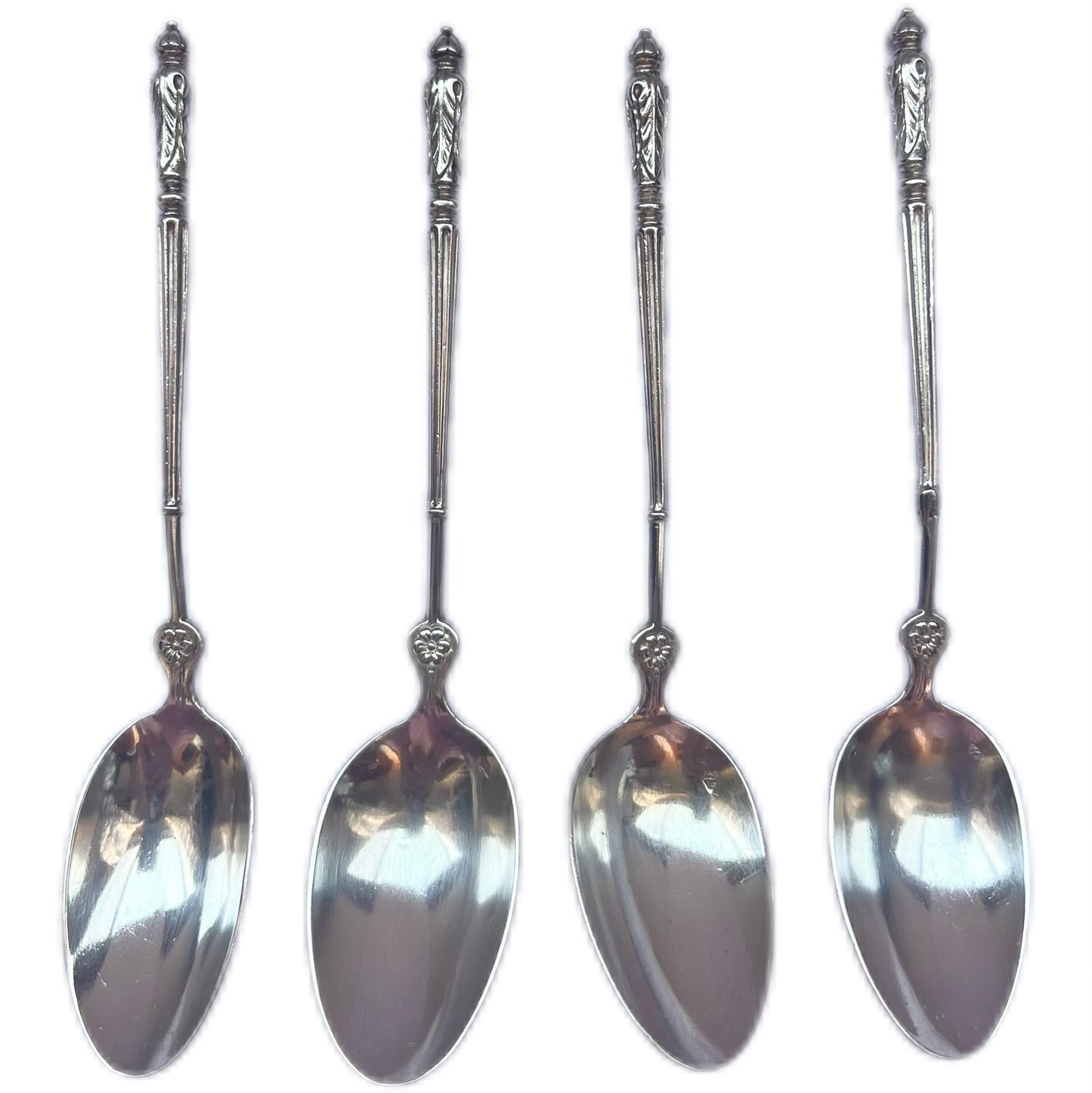 Set of four 19th century silver teaspoons by Emile Puiforcat