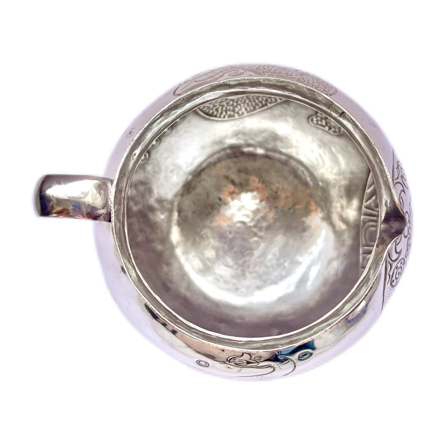 Midcentury Mexican sterling silver pitcher with varying Aztec motifs