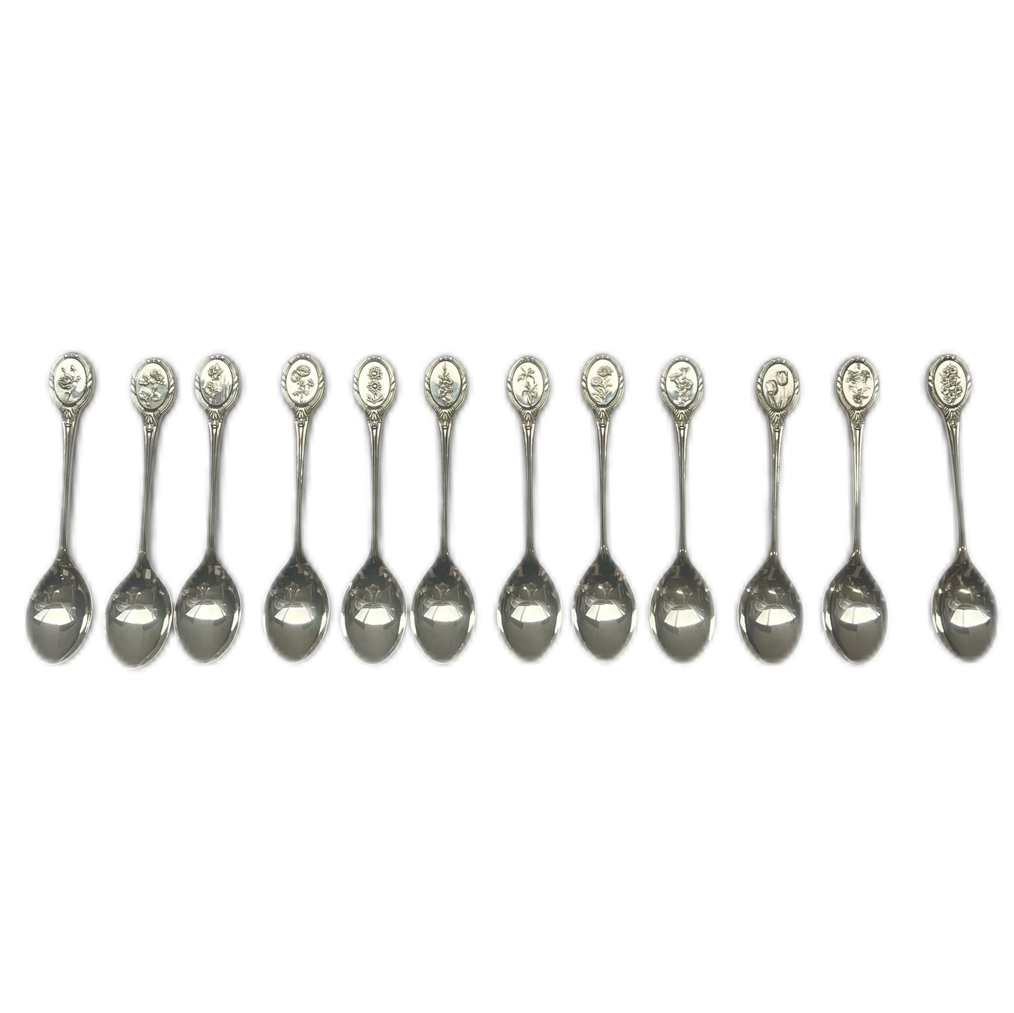 Set of 12 vintage sterling silver Royal Horticultural Society flower spoons made by John Pinches