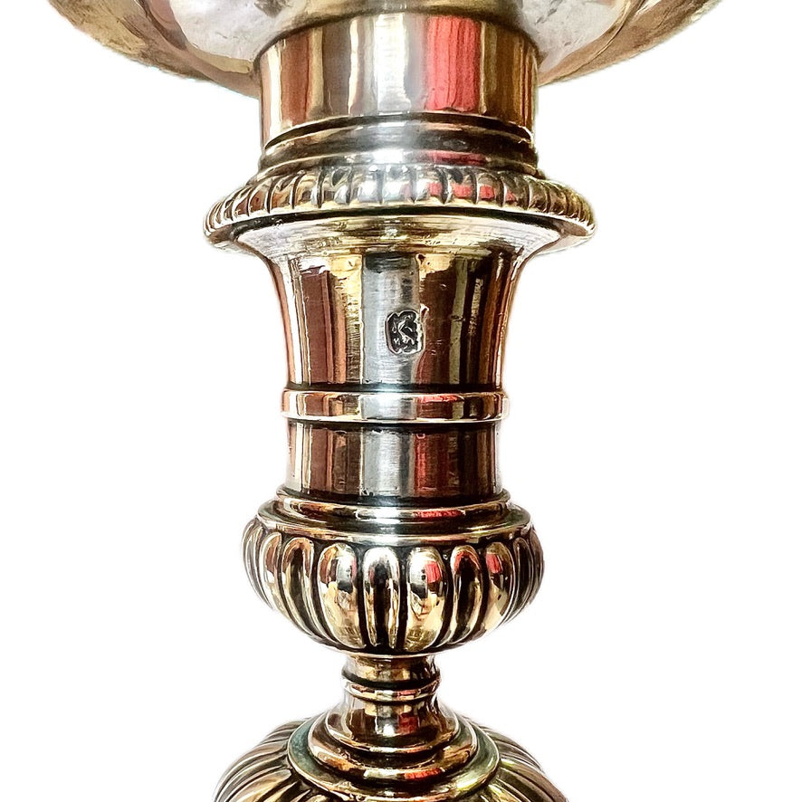 Crested pair of George II sterling silver candlesticks by Elizabeth Godfrey