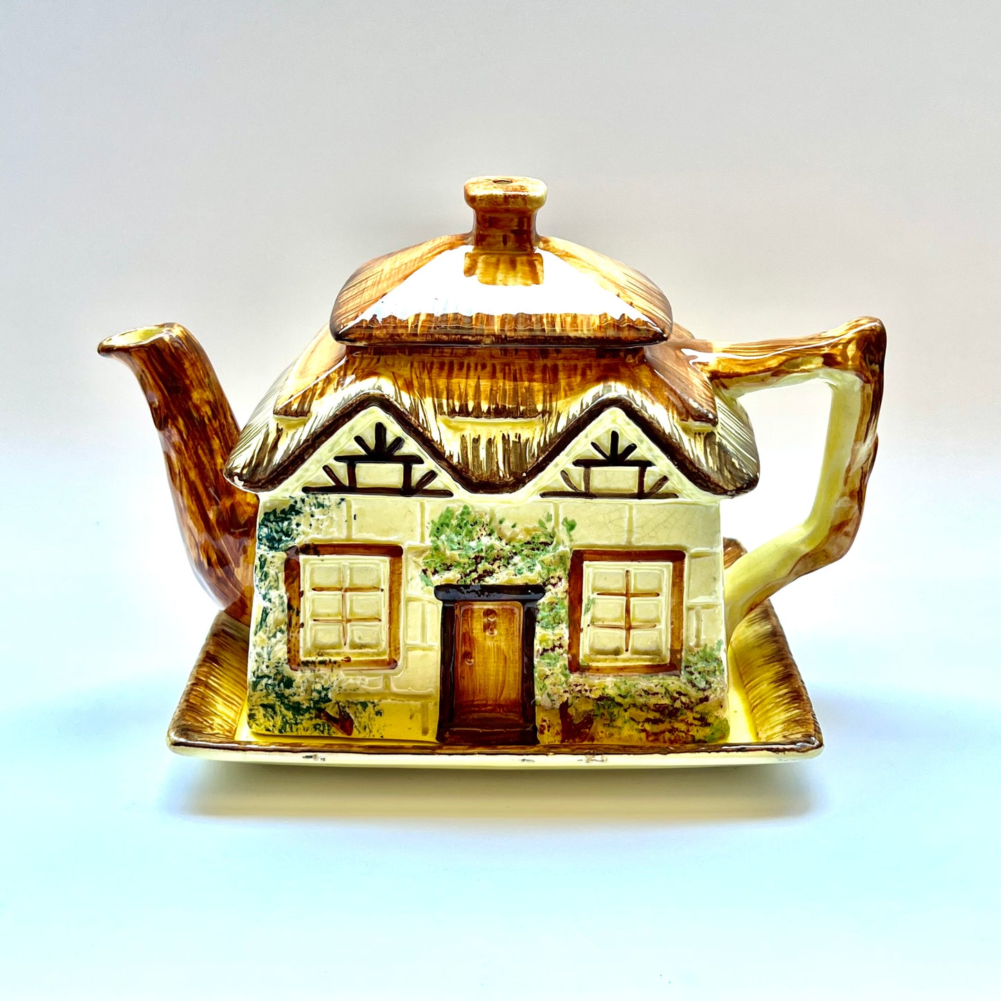 Vintage English novelty cottageware teapot with original tray made by Keele Street Pottery circa 1940s to 60s in Stoke-on-Trent, England