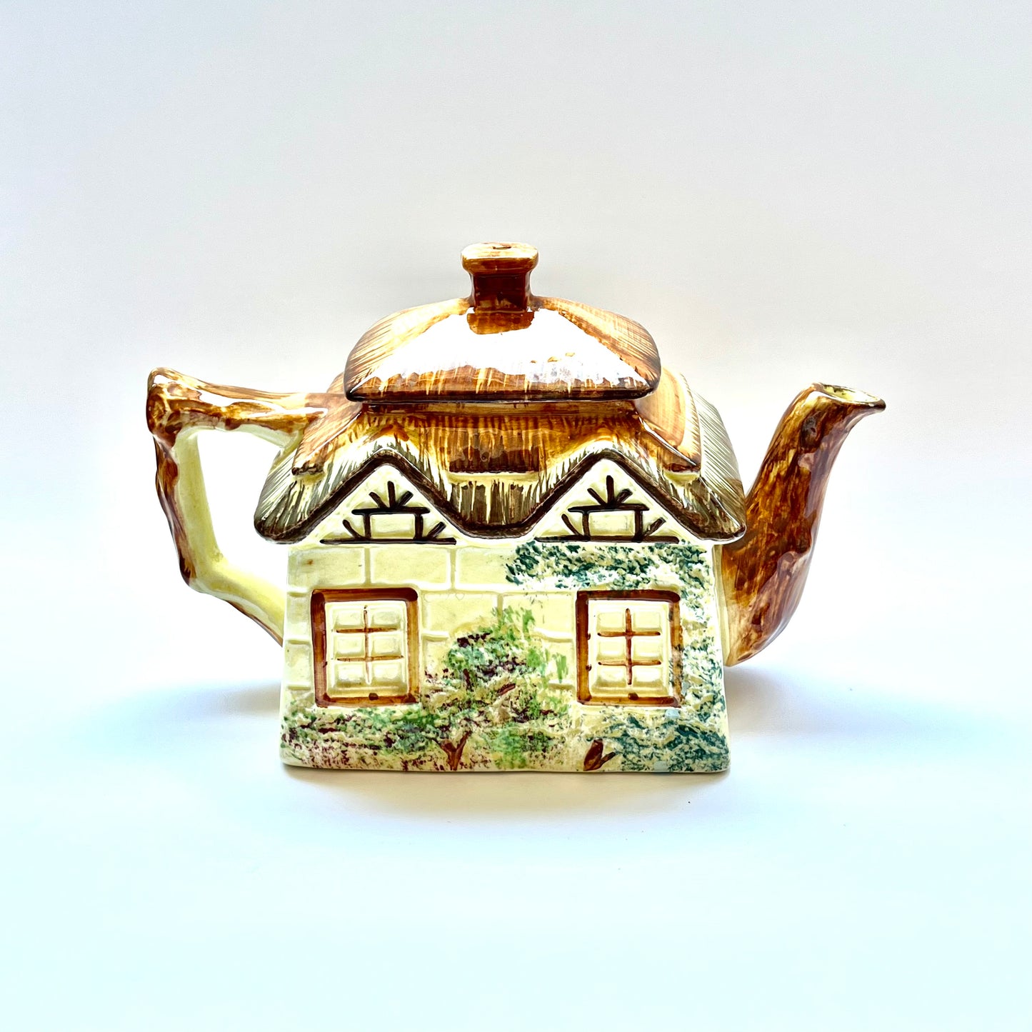 Vintage English novelty cottageware teapot with original tray made by Keele Street Pottery circa 1940s to 60s in Stoke-on-Trent, England