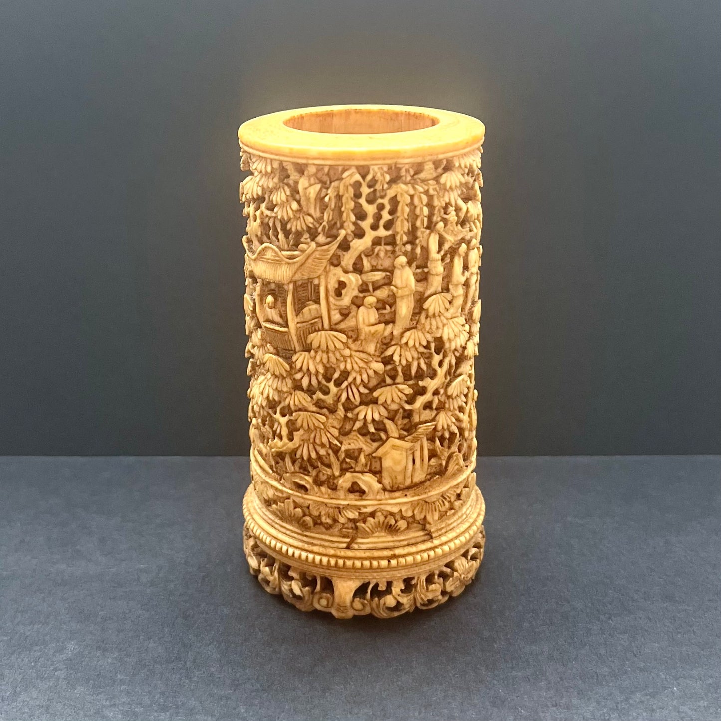 Exceptional late 18th to mid 19th century Qing Dynasty Chinese ivory brush holder with finely carved pavilion scenes