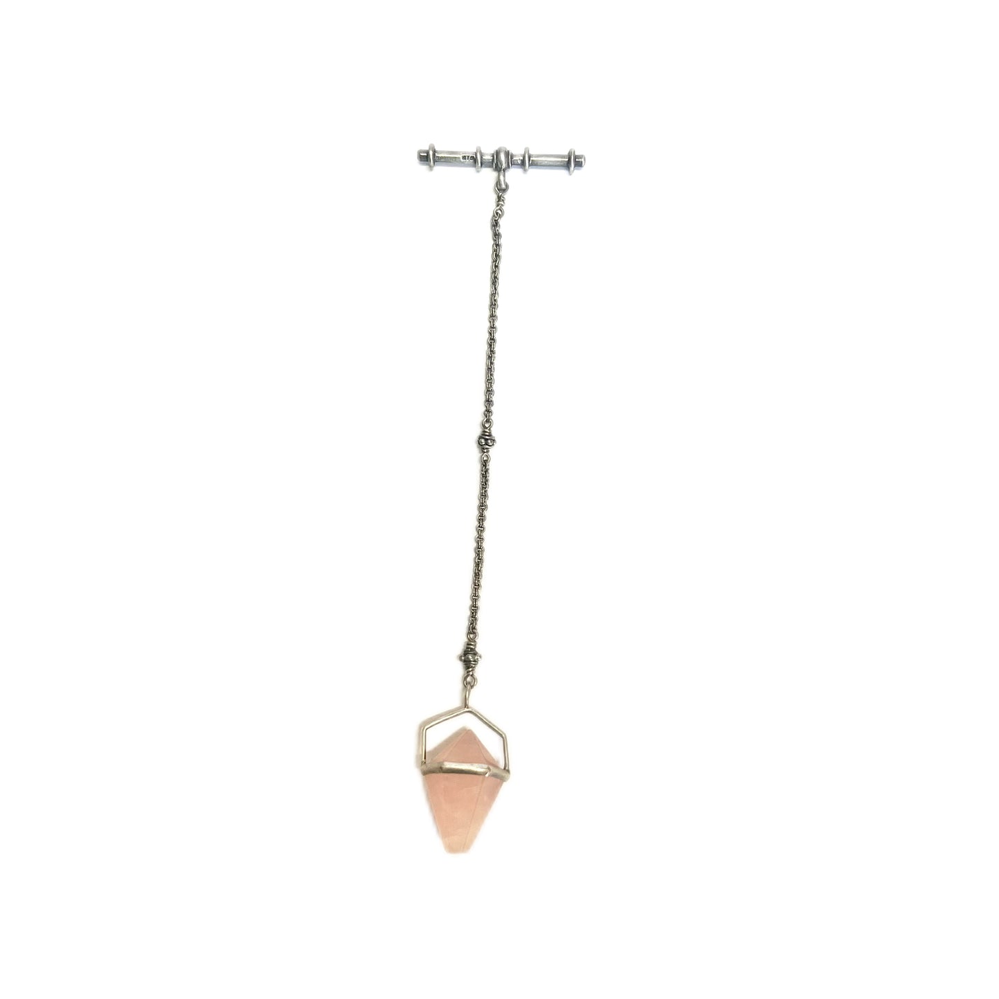 Rose quartz charm suspended from a sterling silver chain with T-bar