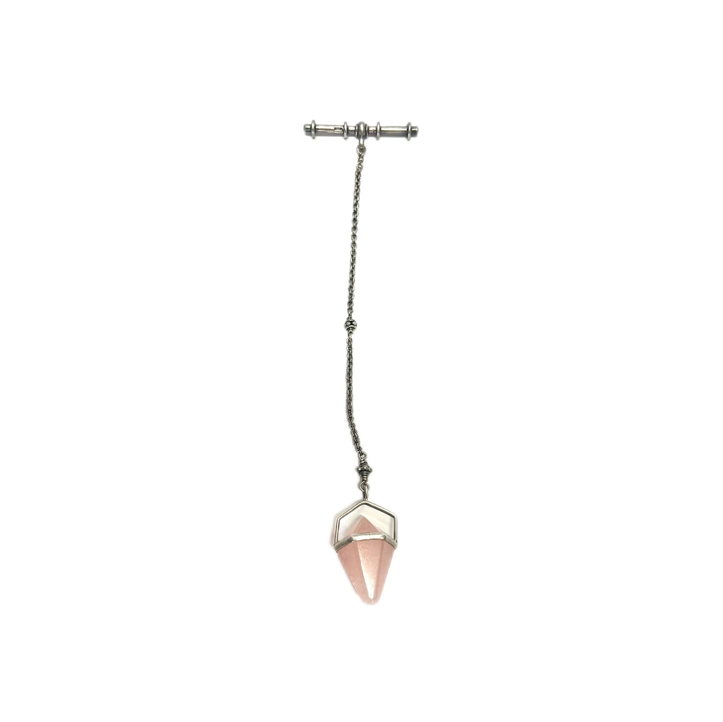 Rose quartz charm suspended from a sterling silver chain with T-bar