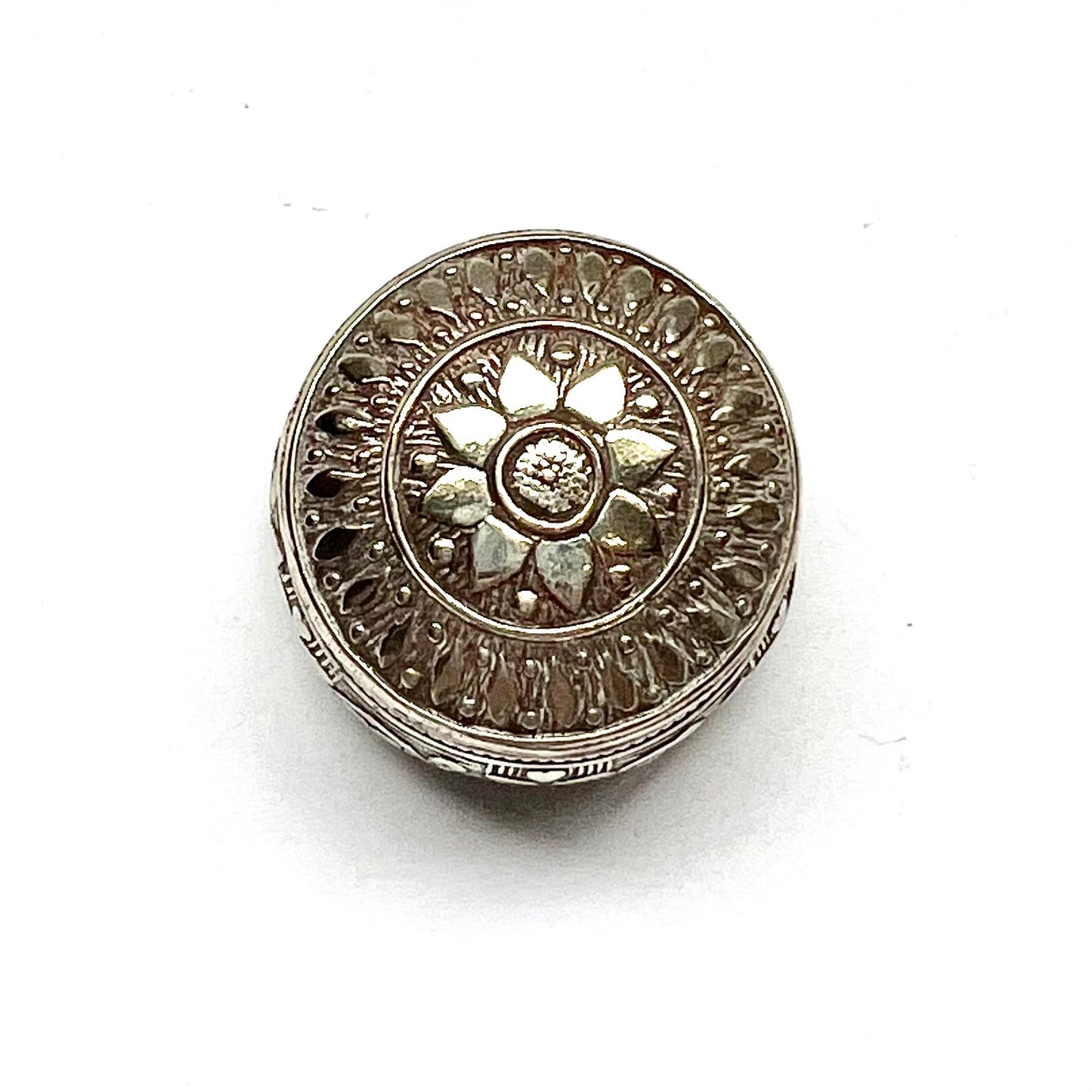 Vintage Middle Eastern, possibly Persian silver pill box, beautiful repousse work and planished details