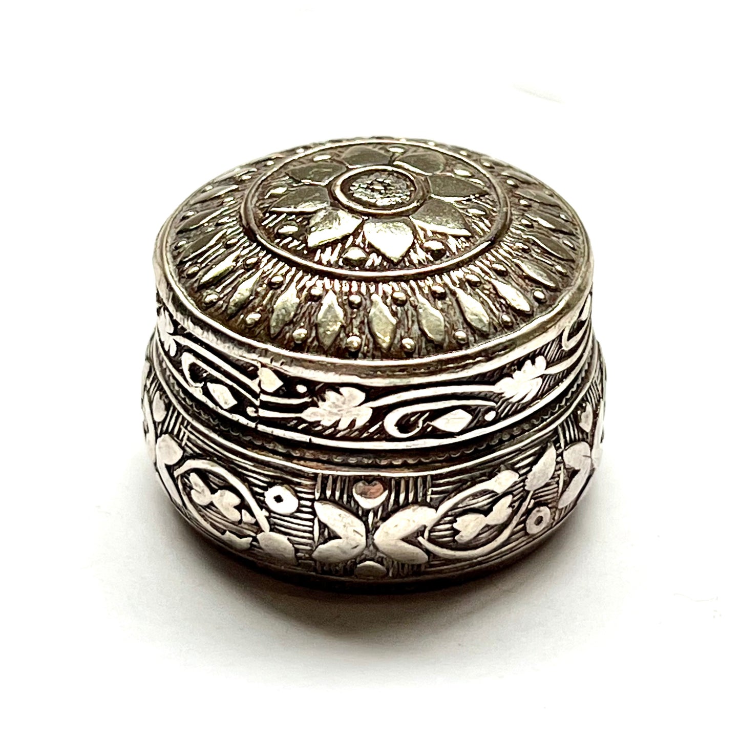 Vintage Middle Eastern, possibly Persian silver pill box, beautiful repousse work and planished details