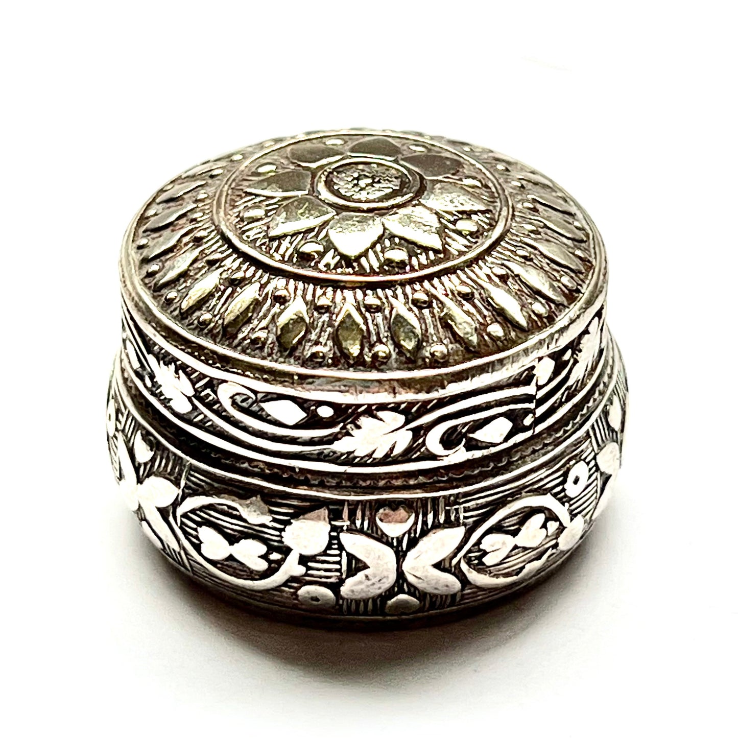 Vintage Middle Eastern, possibly Persian silver pill box, beautiful repousse work and planished details