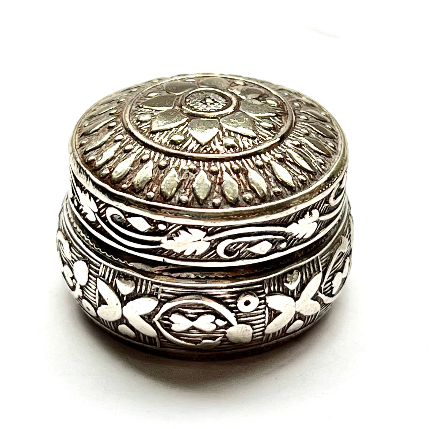 Vintage Middle Eastern, possibly Persian silver pill box, beautiful repousse work and planished details