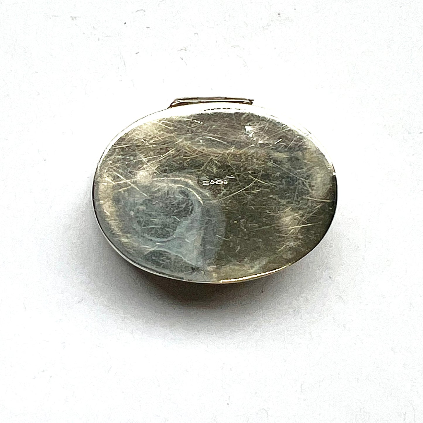 Vintage vintage oval sterling silver pillbox, foliate pattern. English import marks for Mark Houghton, Sheffield, 1993