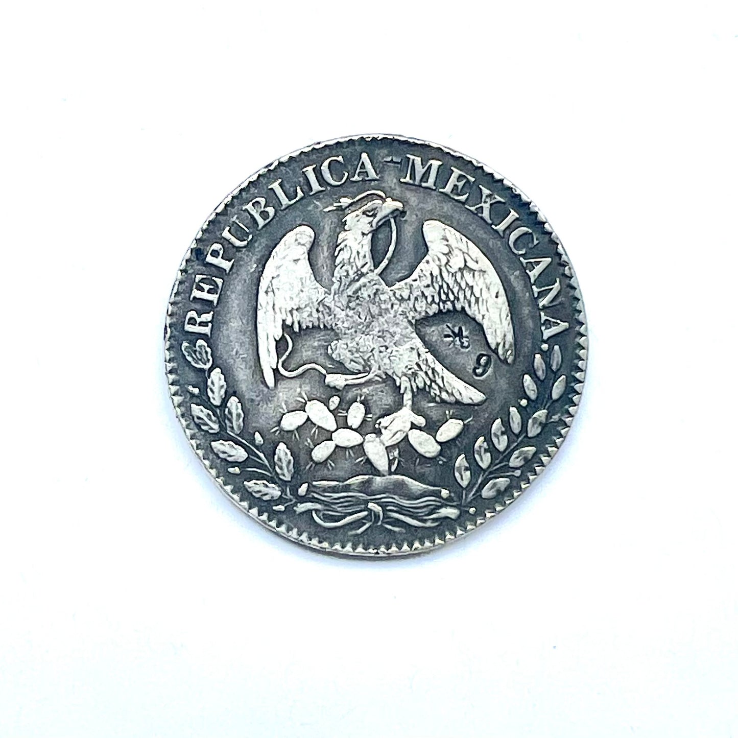 Antique Chinese chopmarked Mexican Republic Libertad Cap and Rays Silver 8 Reales coin issued by the San Luis Potosi Mint circa 1869