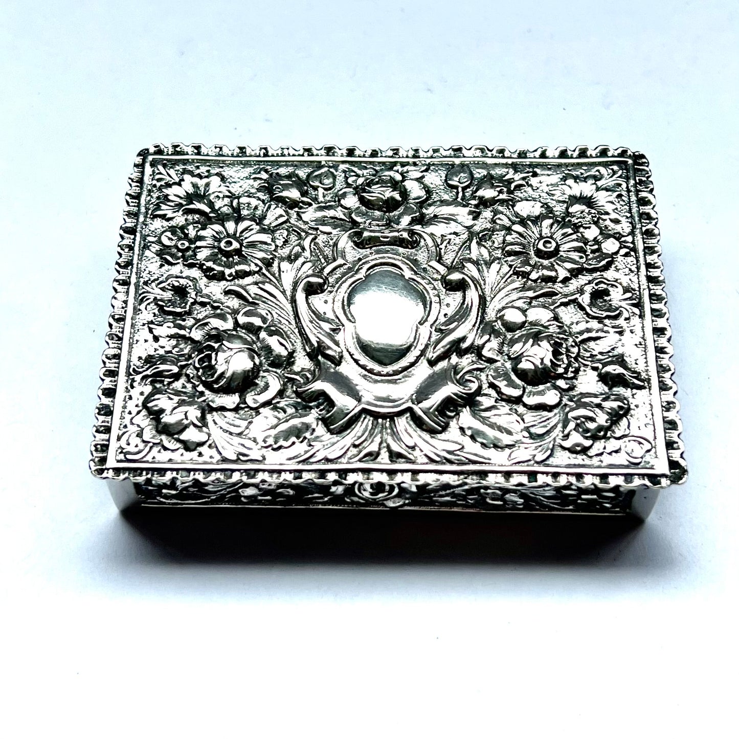 Early to mid 20th century Spanish .915 floral repousse silver box, likely circa 1940s