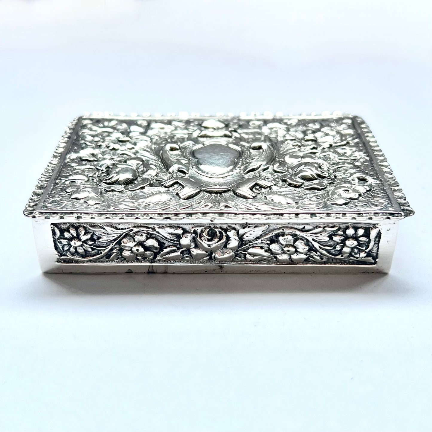 Early to mid 20th century Spanish .915 floral repousse silver box, likely circa 1940s