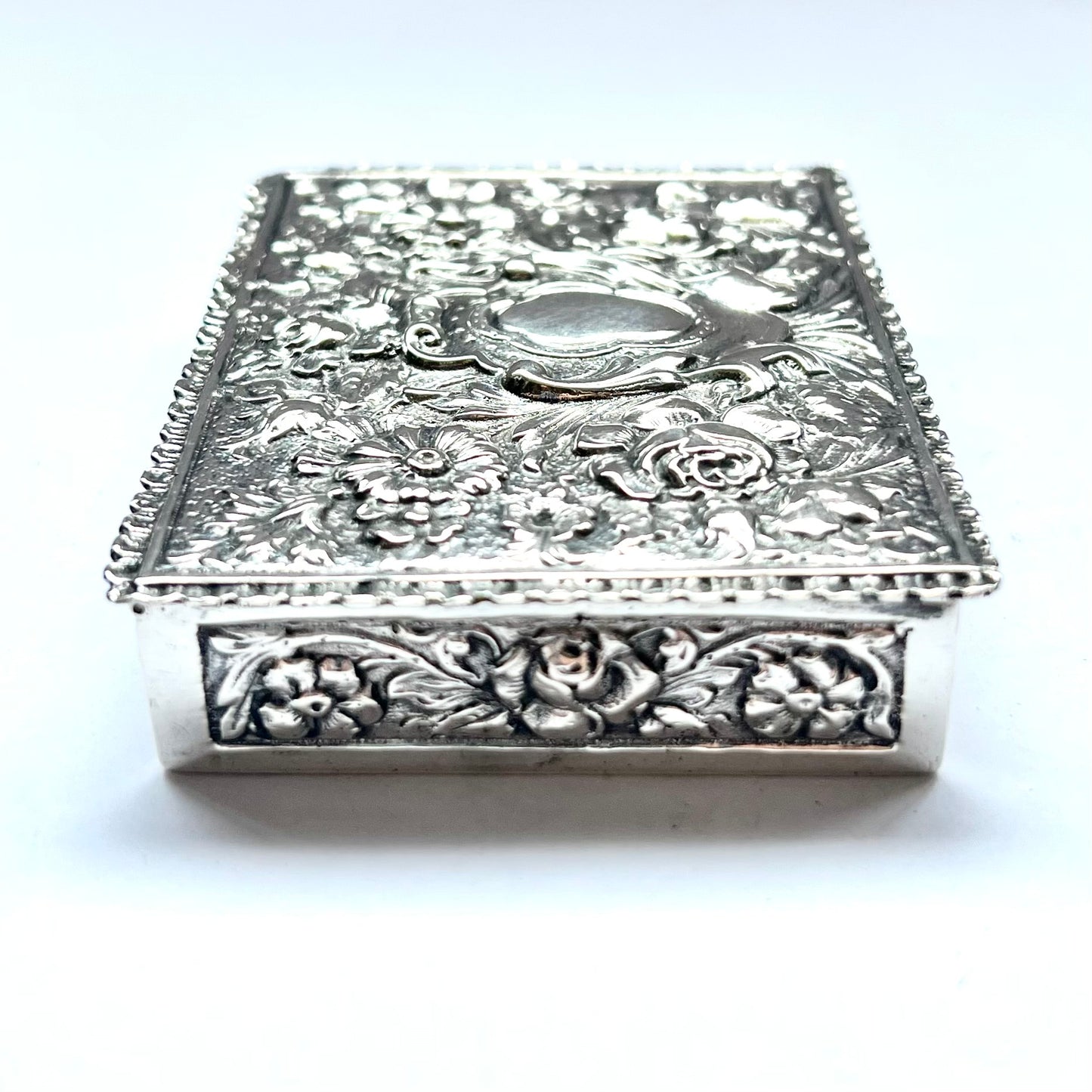 Early to mid 20th century Spanish .915 floral repousse silver box, likely circa 1940s