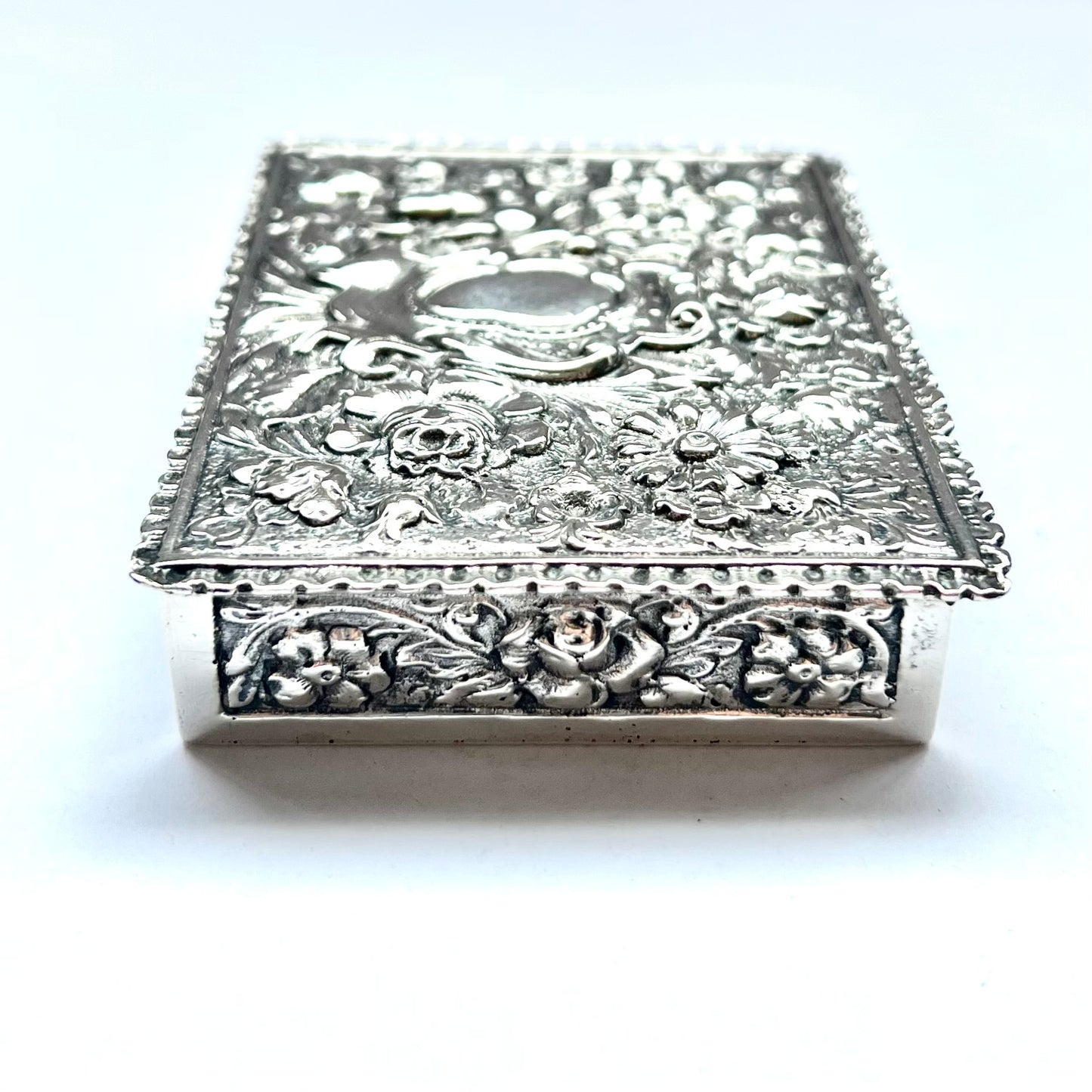 Early to mid 20th century Spanish .915 floral repousse silver box, likely circa 1940s