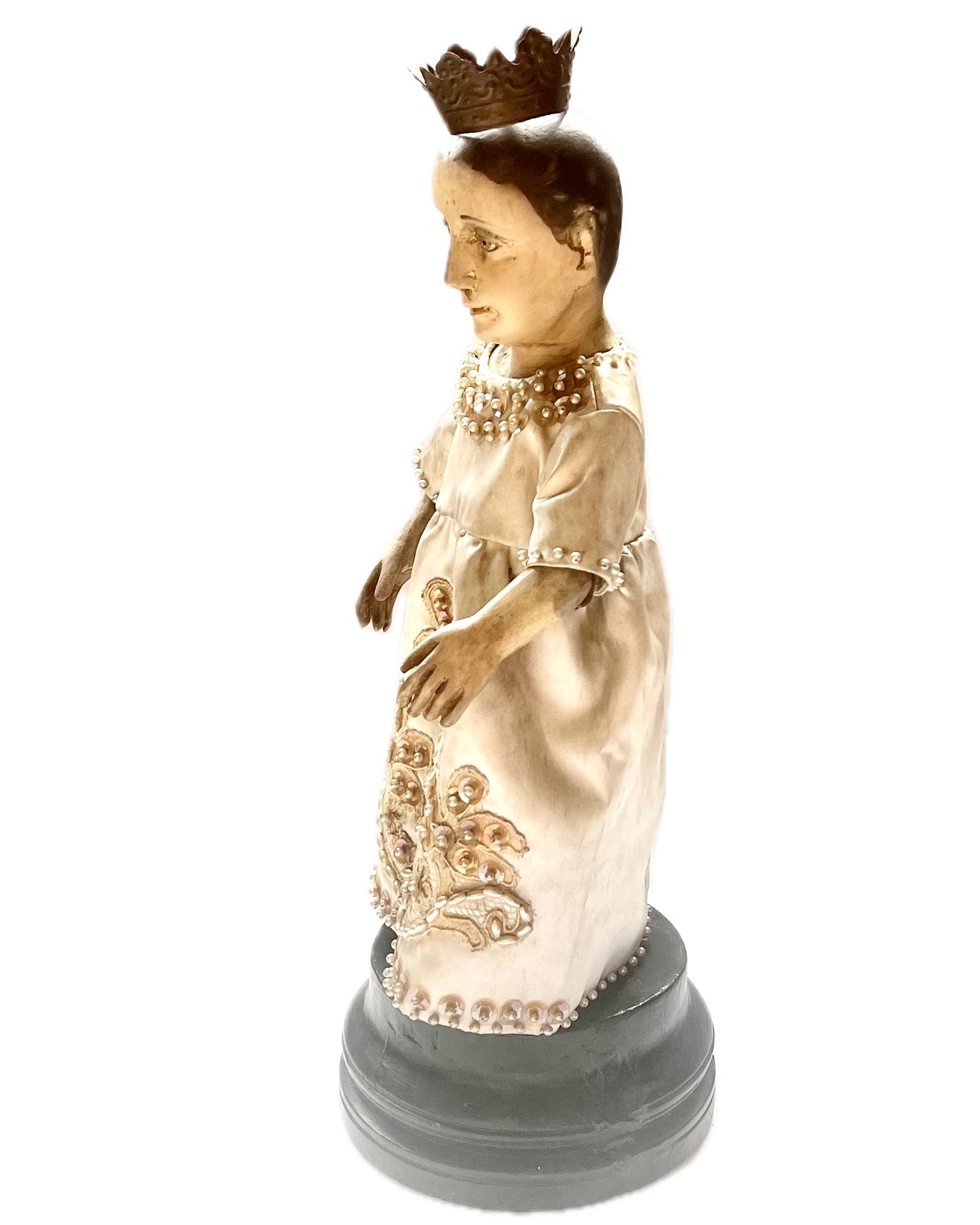 Antique mid to late 19th century timber statue from the Philippines with glass eyes depicting Santo Nino or the Child Jesus