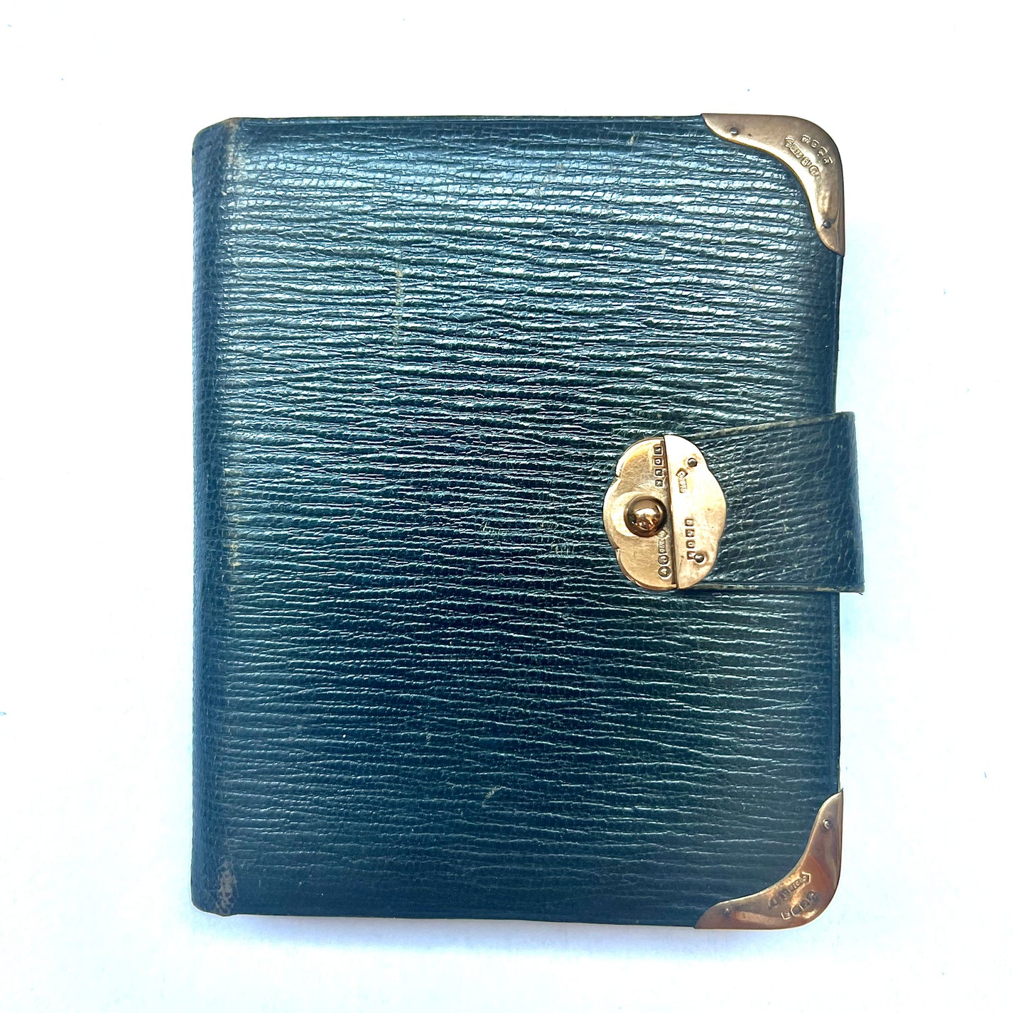 Antique English leather bound address book with 9ct gold clasp and corner details, all