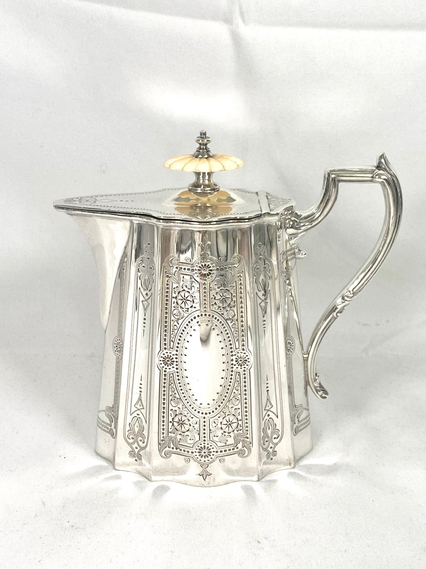 High Victorian Sterling Silver and Ivory Tea Set. James Dixon & Sons, Sheffield, 1878.