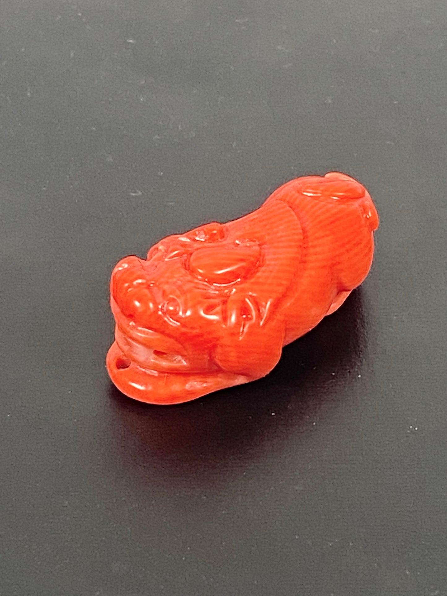 Midcentury Chinese carved coral Foo Lion or Dog Pendant