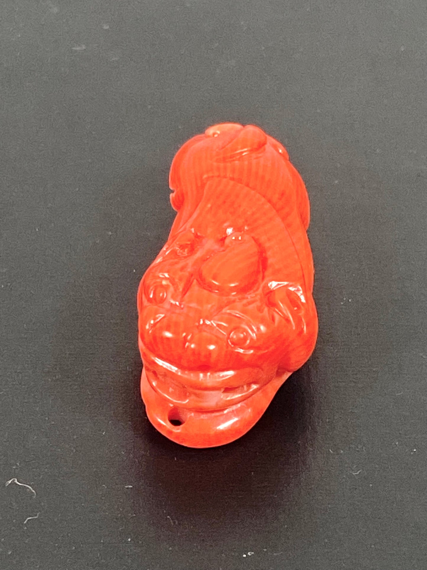 Midcentury Chinese carved coral Foo Lion or Dog Pendant