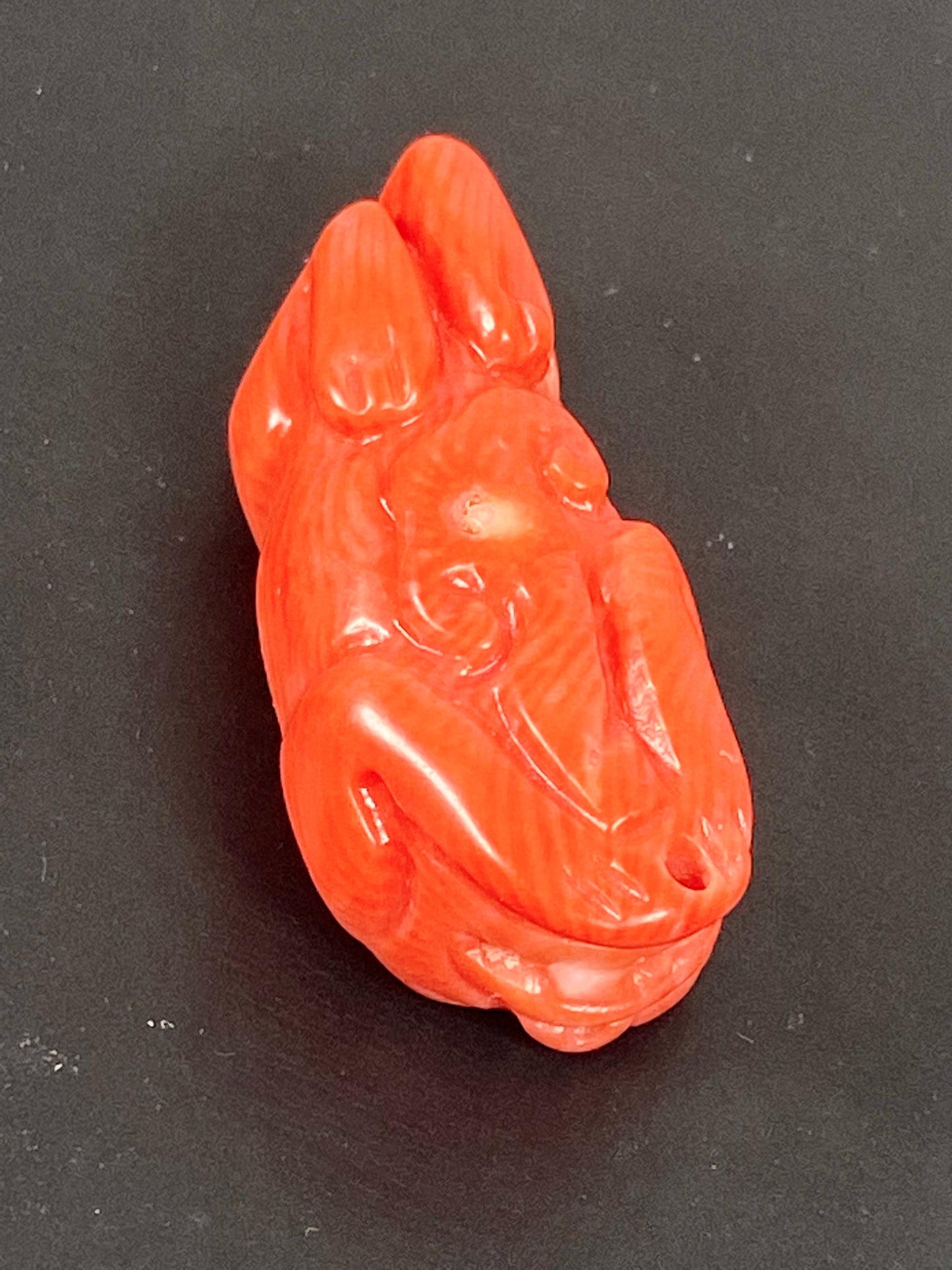 Midcentury Chinese carved coral Foo Lion or Dog Pendant