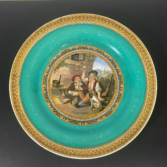 19 世纪中期的普拉特韦尔盘子，描绘了两名工人正在吃午餐