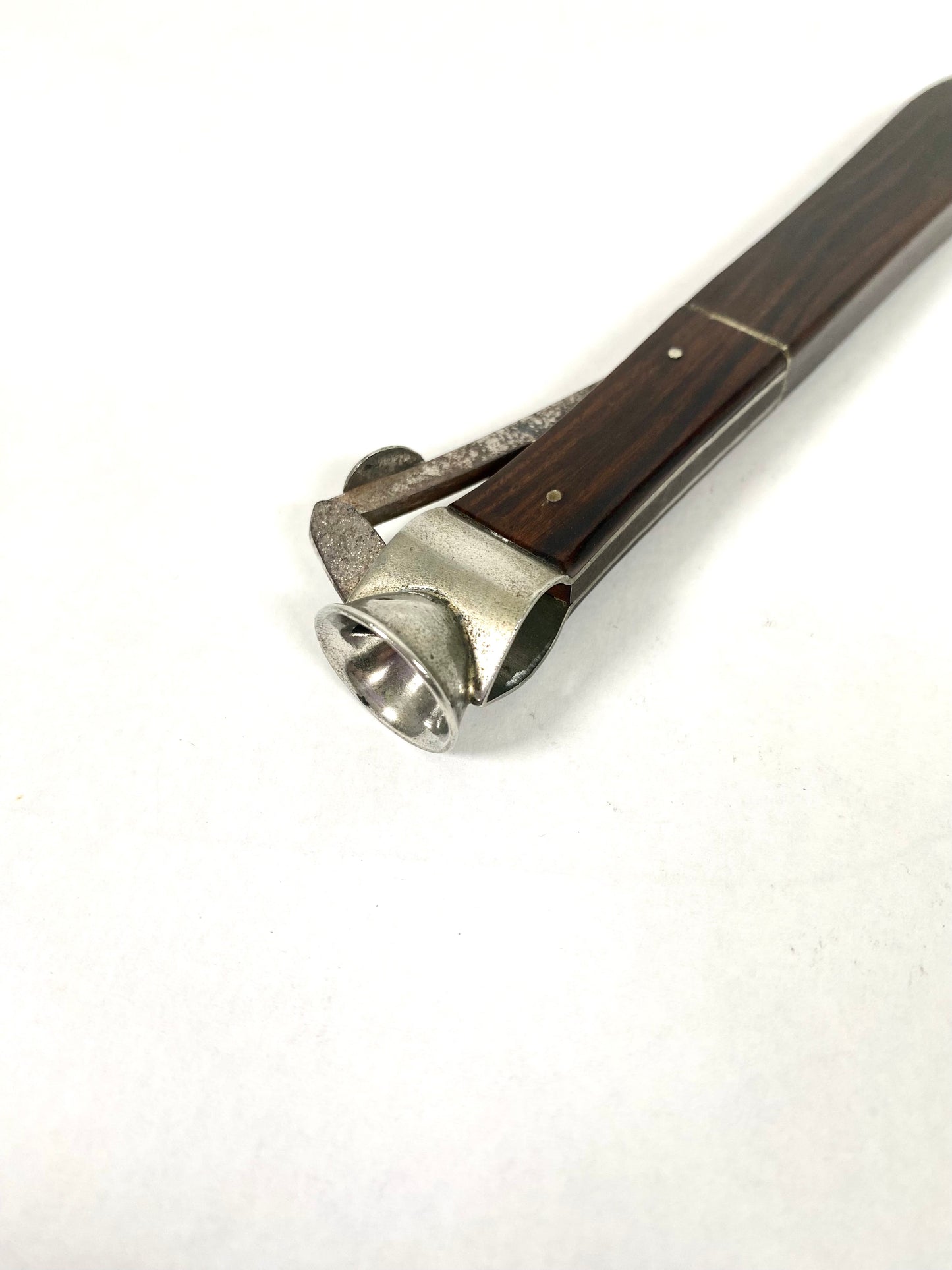 Vintage midcentury, likely chrome and rosewood, cigar cutter