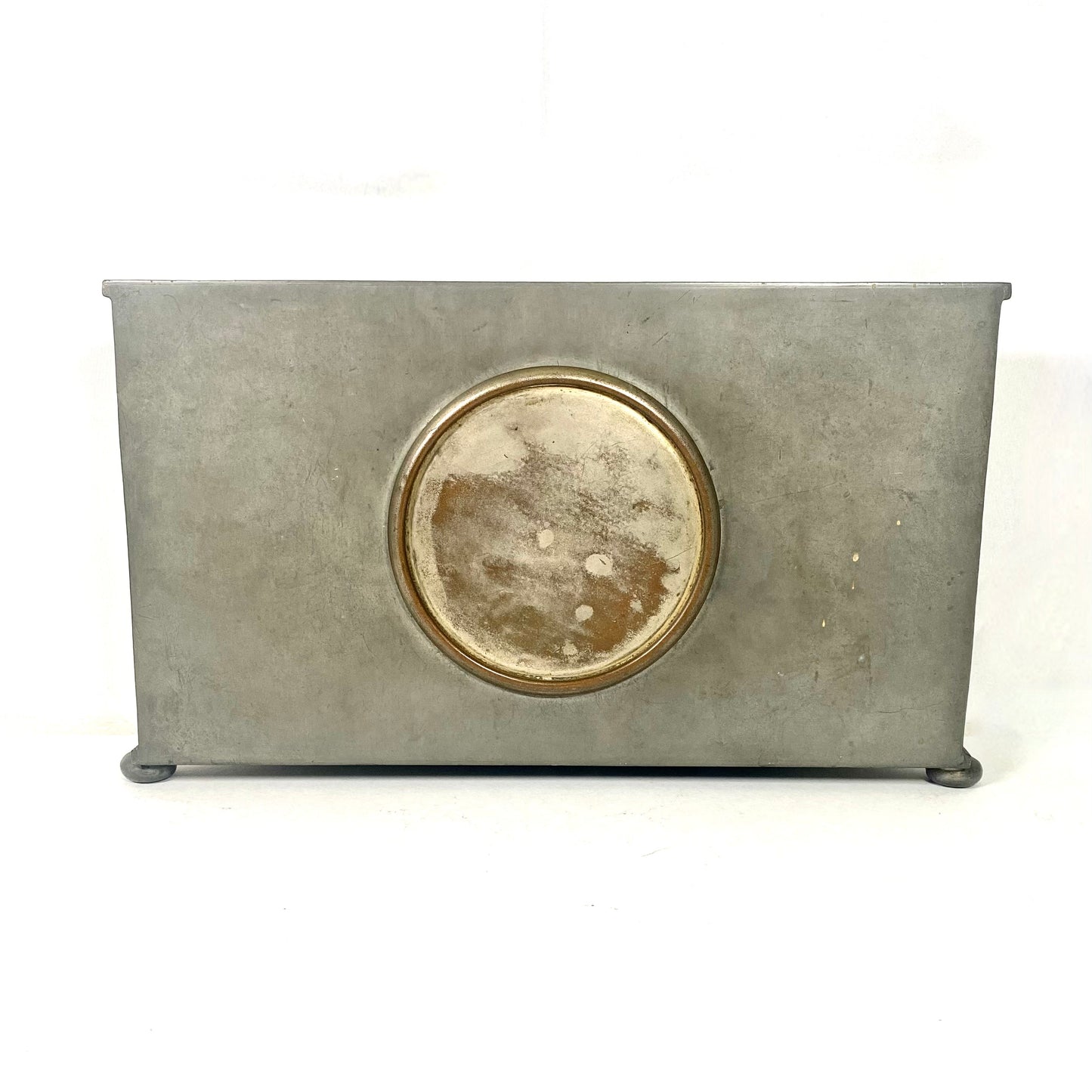 Tudric pewter clock by Liberty & Co.