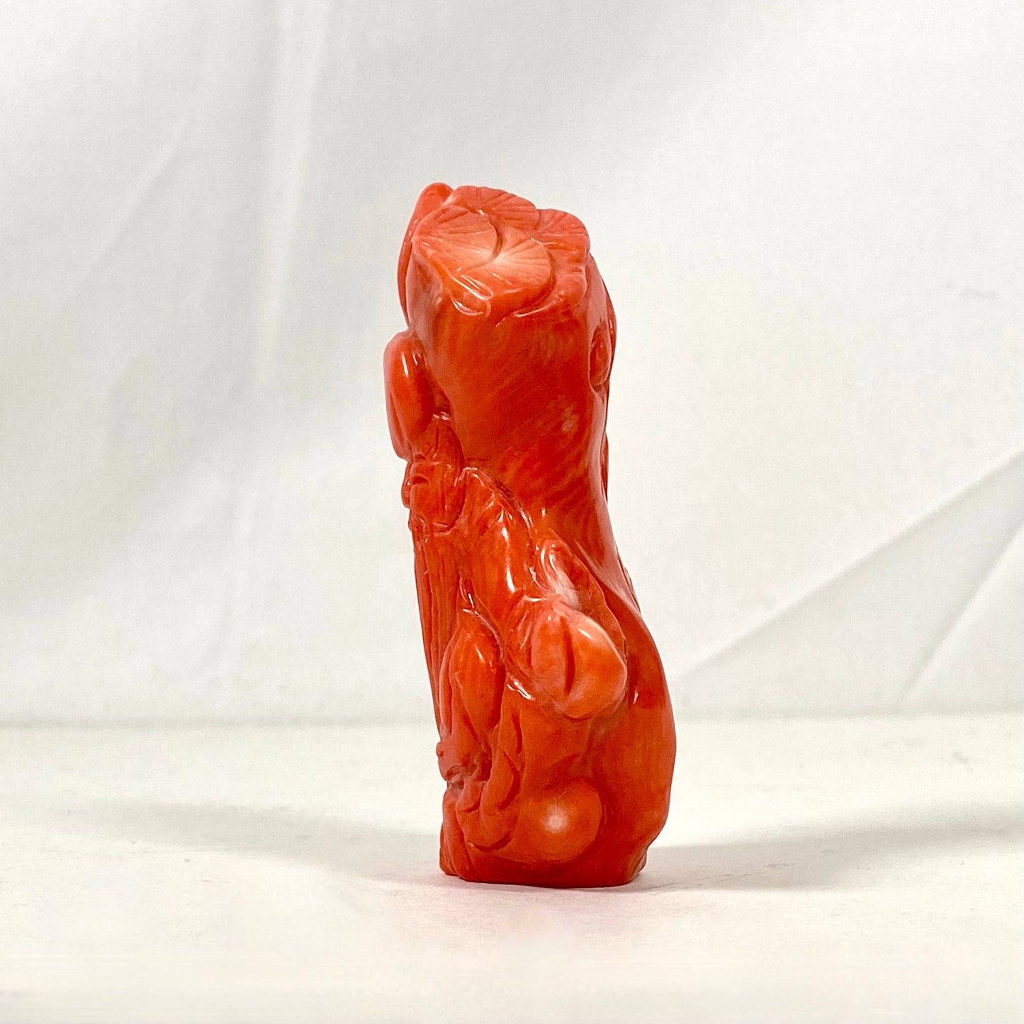 Midcentury Chinese natural carved coral Shoulao figurine, substantial size