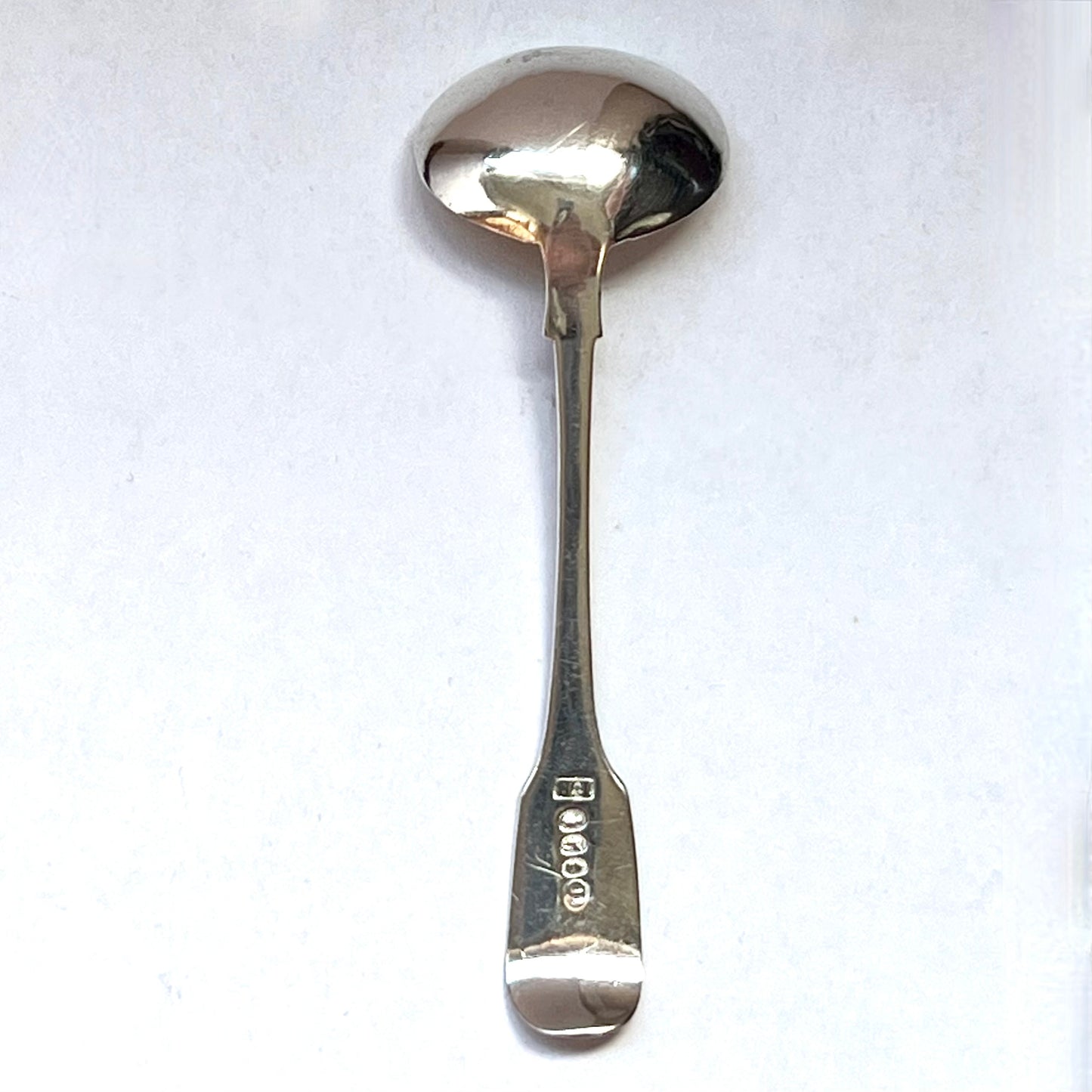 Georgian sterling silver mustard spoon with marks for Dublin, 1824 and maker’s marks attributed to James Brady (I.B)