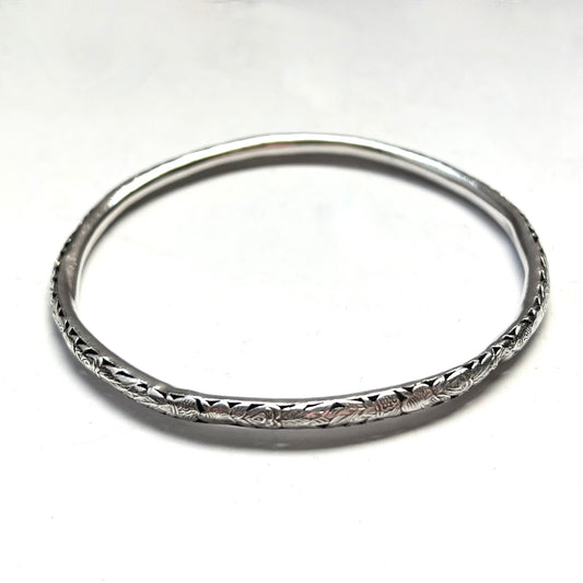 Vintage Tribal Silver Hollow Bangle with heavily worked pattern