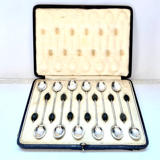 Art Deco century set of 12 sterling silver coffee spoons in original case by Asprey, marks for Birmingham 1919