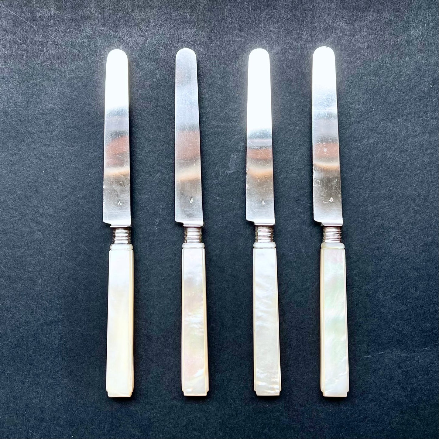 Antique set of 4 French .800 silver knives with mother of pearl handles