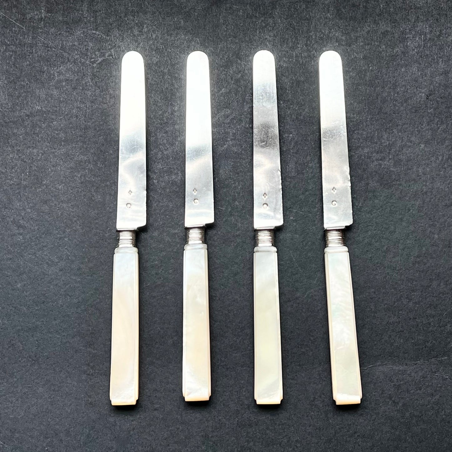 Antique set of 4 French .800 silver knives with mother of pearl handles