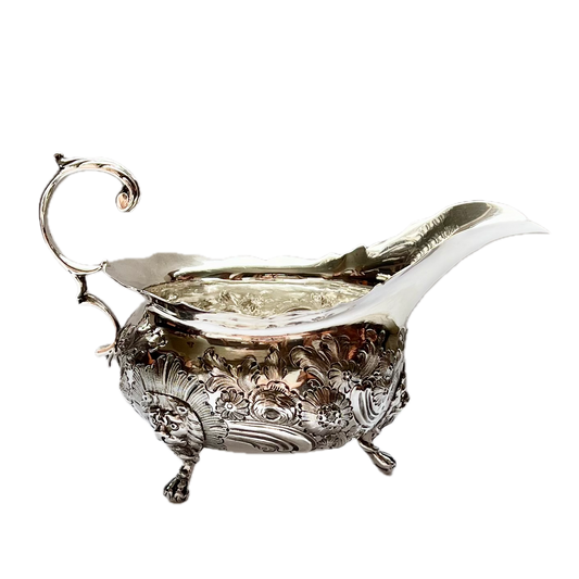 Substantial early Victorian crested sterling silver gravy or sauce boat. John Wellby, London, 1843