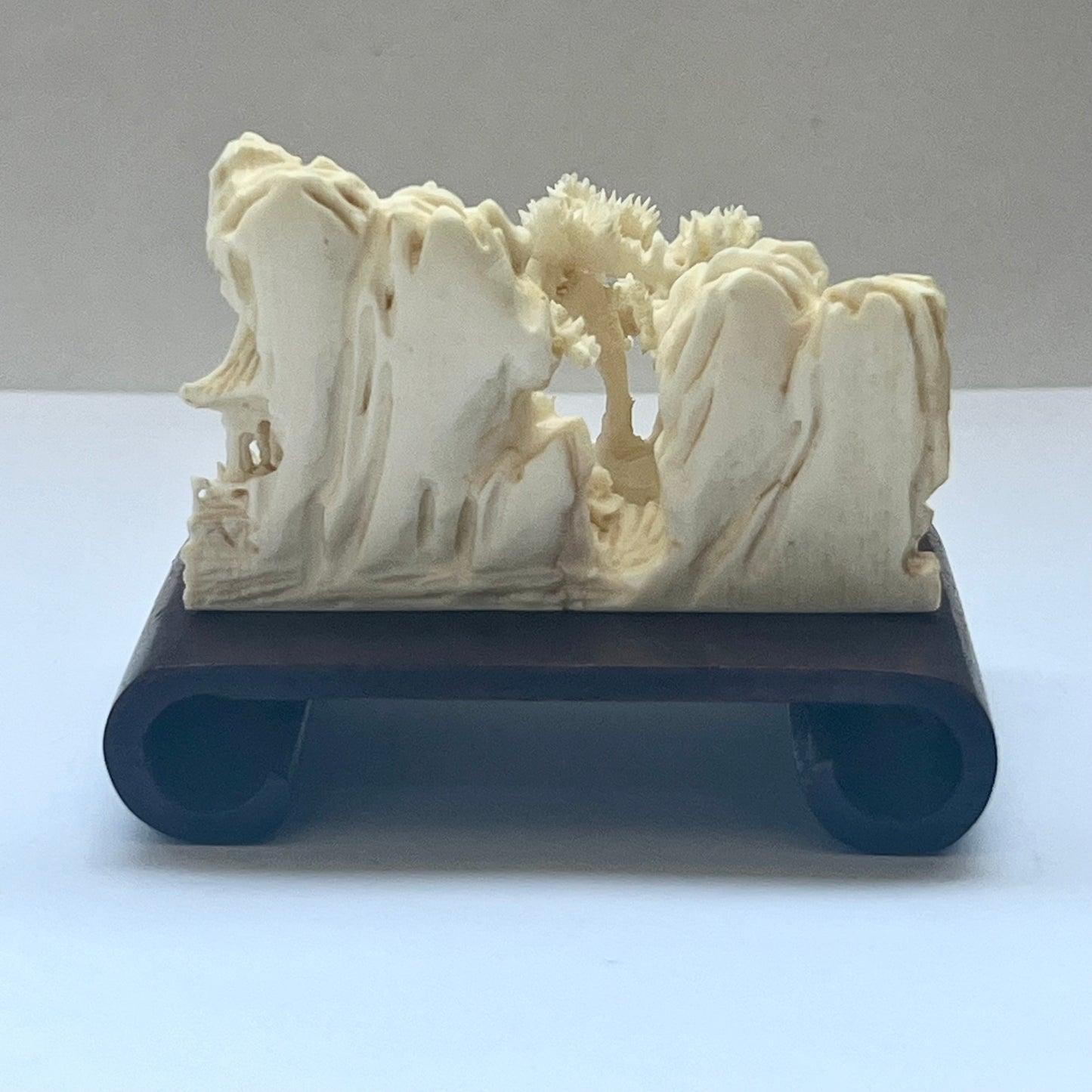 A rare and lovely early Japanese export trade ivory carving, Riverside Scene circa late 19th century