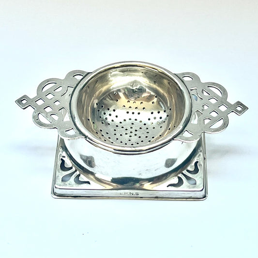 Fine English Art Deco silver-plate tea-strainer with original base, circa 1920s to 40s