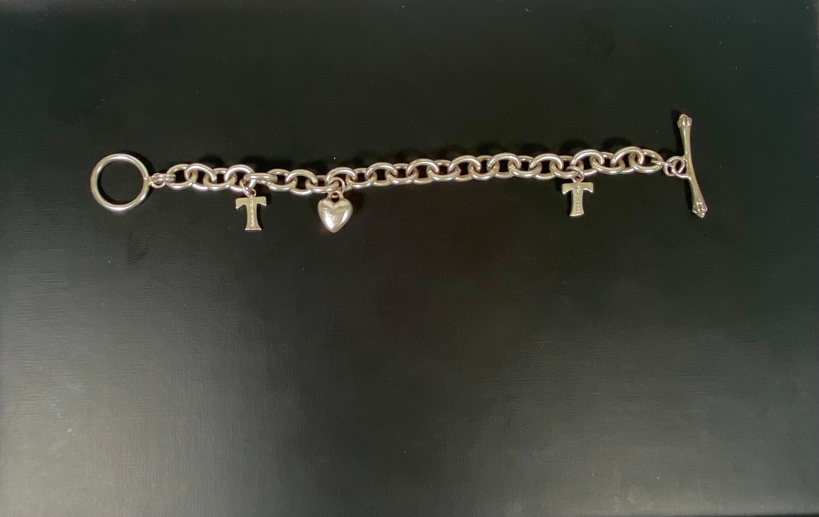 Vintage tiffany charm on sale bracelet