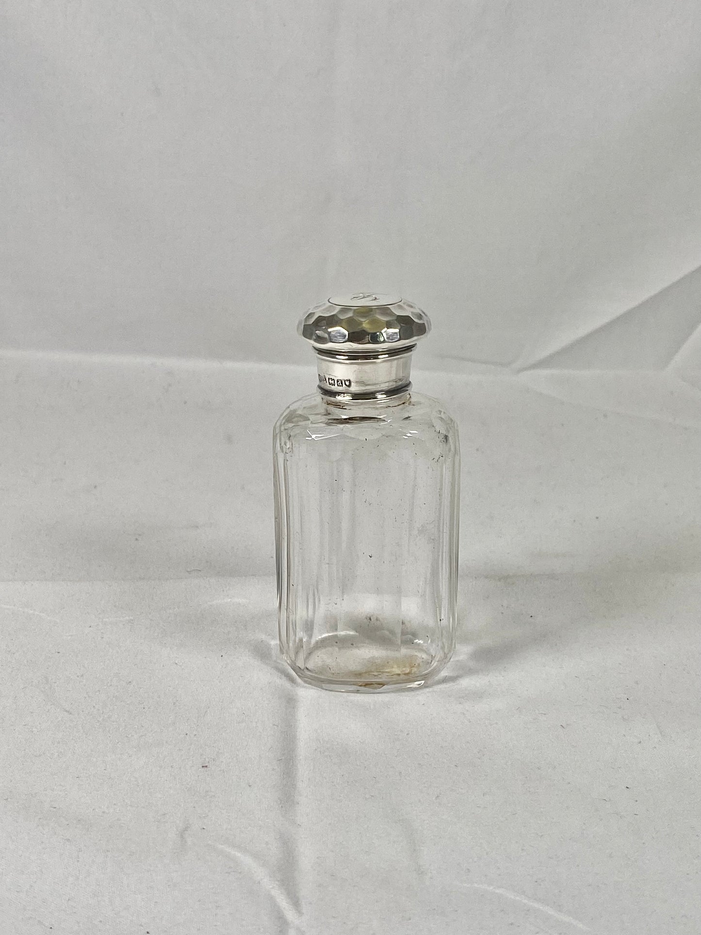 Victorian Cut Glass Bottle Hallmarked London 1899 with Planished Sterling Silver Lid