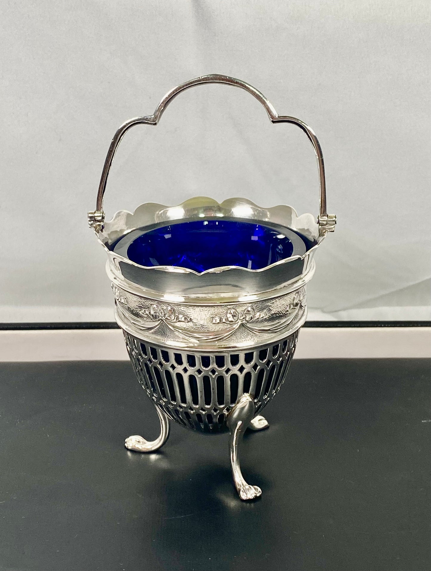 Late Victorian sterling silver pierced egg-shaped basket w cobalt blue glass liner