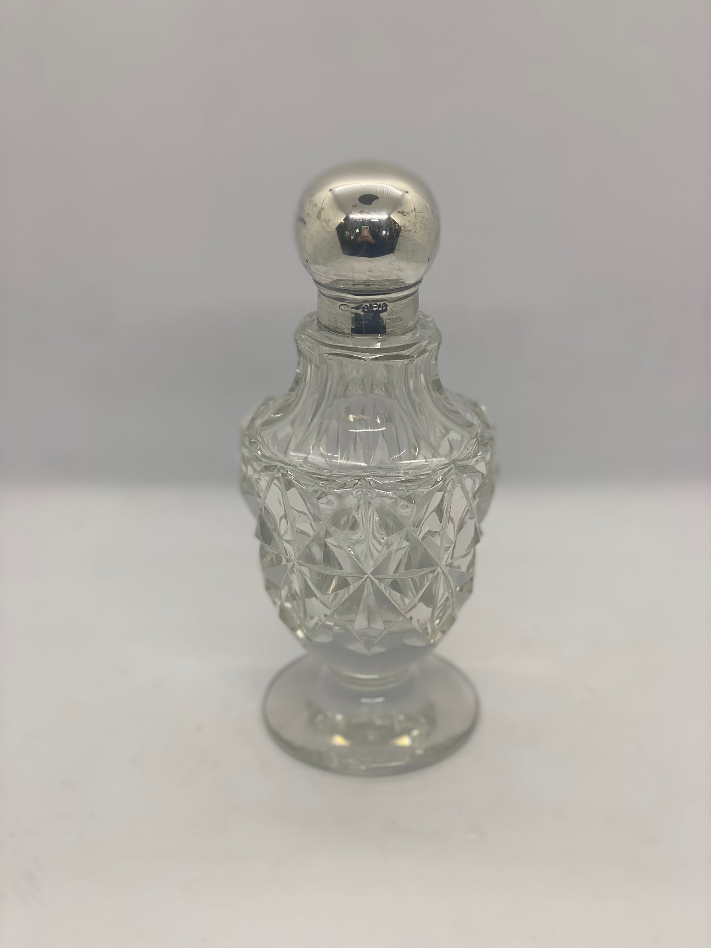 Cut Crystal Bottle Hallmarked London 1919 with Silver Lid