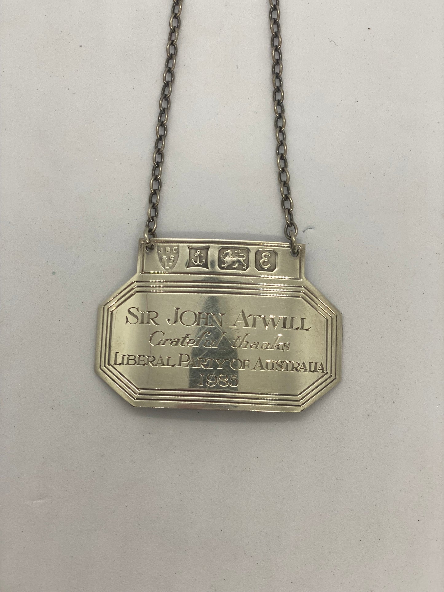 1979 Sterling silver Liquor Tag ex. personal collection of Sir John Atwill