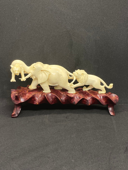 Large Antique Ivory Piece Depicting Two Lions and an Elephant