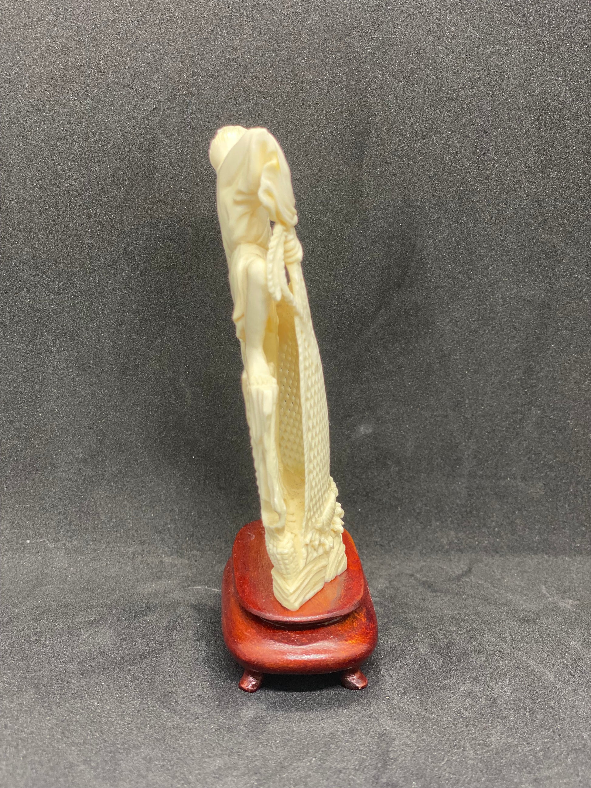 asian fisherman with net fish figurine ivory hand carved Small ivory figurine of fisherman holding net