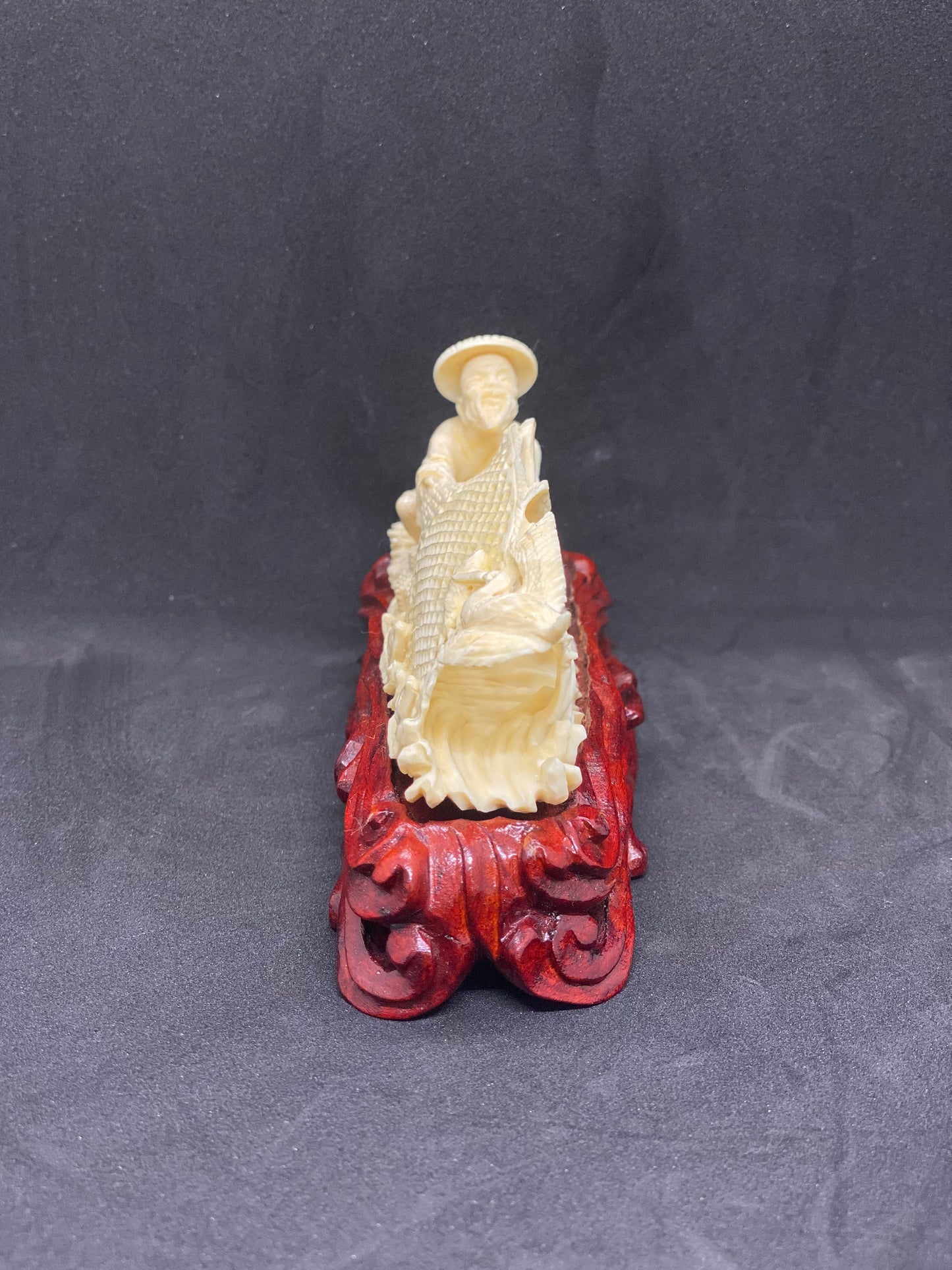 Small Ivory Figurine of Fisherman holding Net w Crane